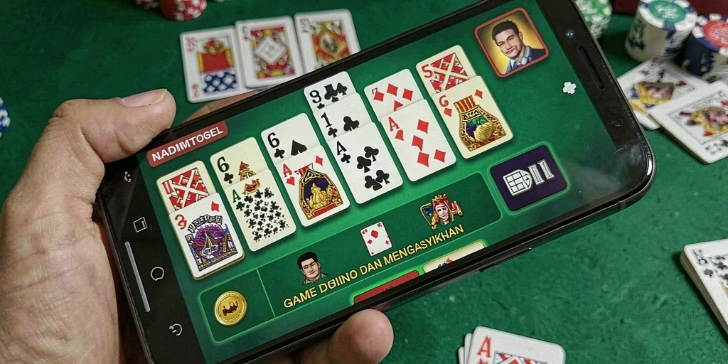 Tampilan gameplay seru dari NADIMTOGEL yang menampilkan cara bermain Domino.